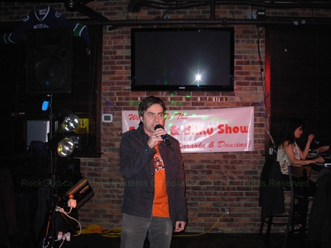 Michael singing at East Side Marios